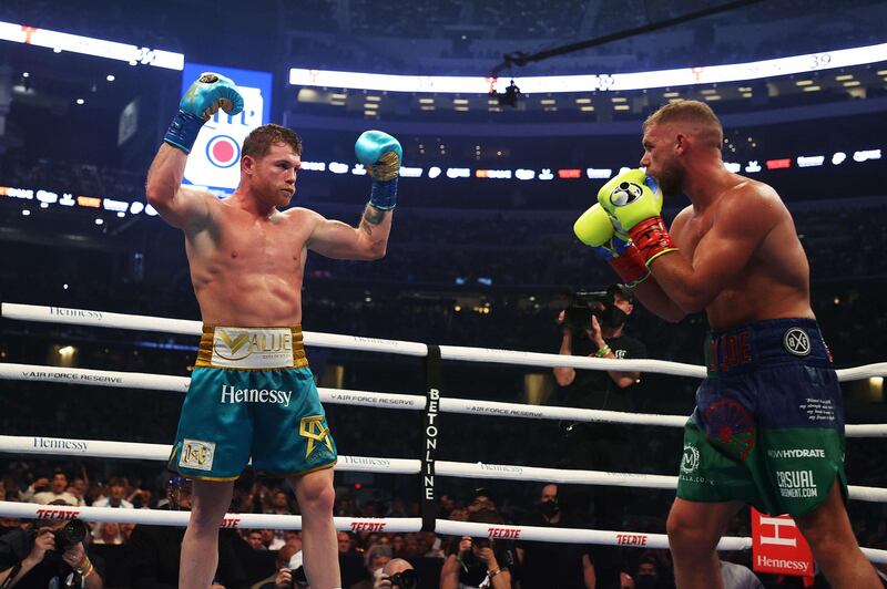 Saul Alvarez gets the crowd going against Billy Joe Saunders during their fight at AT&T Stadium. AFP