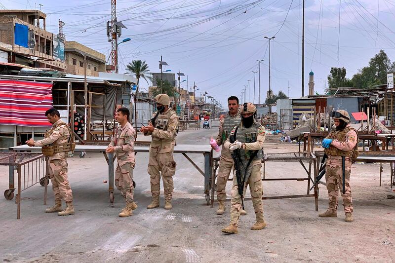 Iraqi security forces shut down popular markets in Sadr City in eastern Baghdad. AP