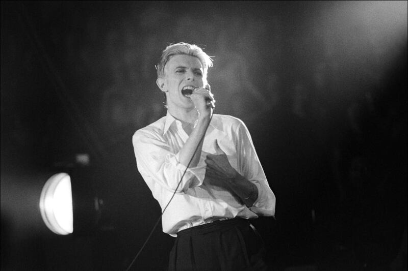 David Bowie performs at Madison Square Garden, New York in 1976. Allan Tannenbaum / Getty Images.