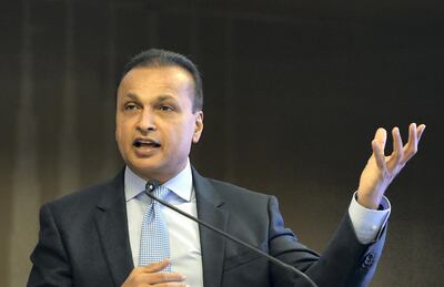 Indian industrialist and Reliance ADAG CEO Anil Ambani speaks during a news conference in Mumbai on June 2, 2017. - Indian billionaire Anil Ambani insisted June 2 that debt-saddled Reliance Communications had a bright future as he moved to reassure investors who are worried that the telecoms company is close to defaulting on loans. (Photo by PUNIT PARANJPE / AFP)