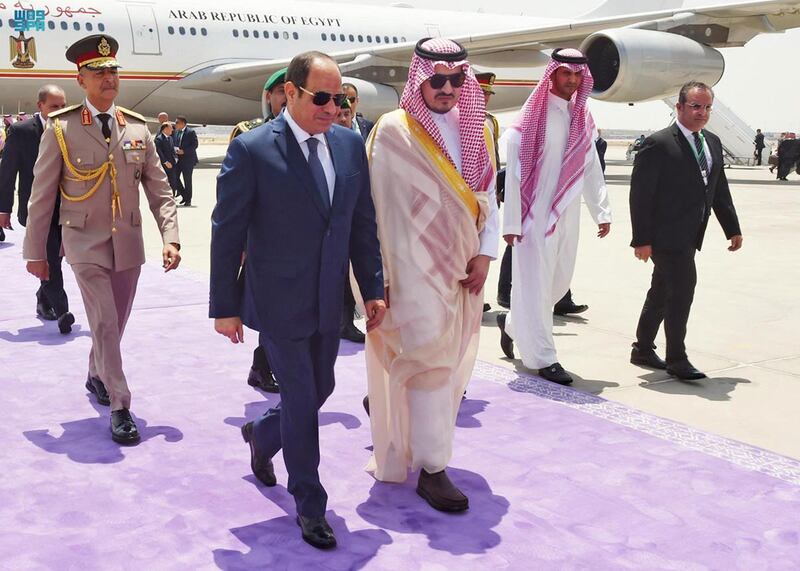 Prince Badr welcomes Egypt's Mr El Sisi in Jeddah before the Arab League summit. AFP