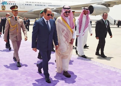 Saudi Arabia's Prince Badr bin Sultan welcomes Egypt's President Abdel Fattah El-Sisi in Jeddah on the eve of the Arab League Summit. SPA / AFP
