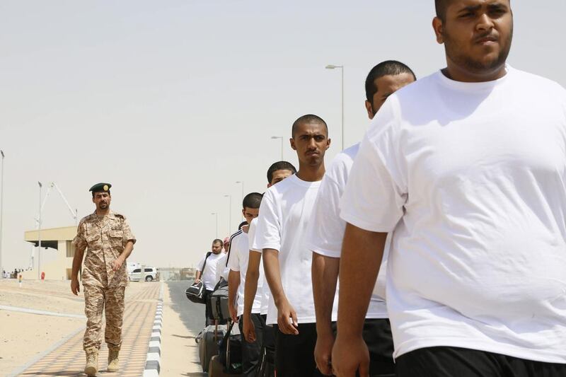 Emirati-high-school graduates begin their military service at Seeh Al Hama military camp near the Omani border. Wam