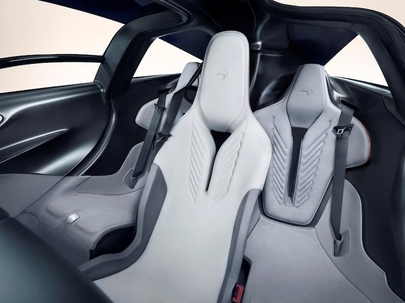 With a central driving position, and twin passenger seats positioned behind on either side, it evokes the McLaren F1. McLaren