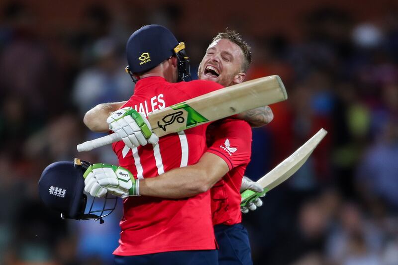 England batsmen Jos Buttler (R) and Alex Hales celebrate beating India in the T20 World Cup semi-final at  the Adelaide Oval on November 10, 2022. EPA