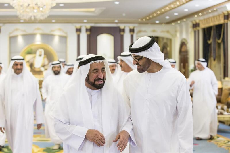 Sheikh Mohammed bin Zayed, Crown Prince of Abu Dhabi and Deputy Supreme Commander of the UAE Armed Forces, speaks with Dr Sheikh Sultan bin Mohammed Al Qasimi during an Iftar reception at Mushrif Palace. Ryan Carter / Crown Prince Court — Abu Dhabi
