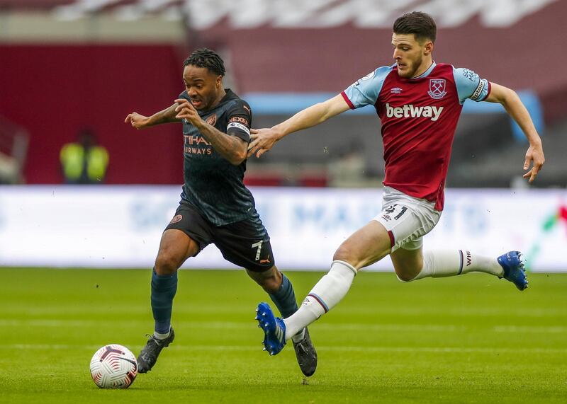 City's Raheem Sterling under pressure from Declan Rice of West Ham. EPA