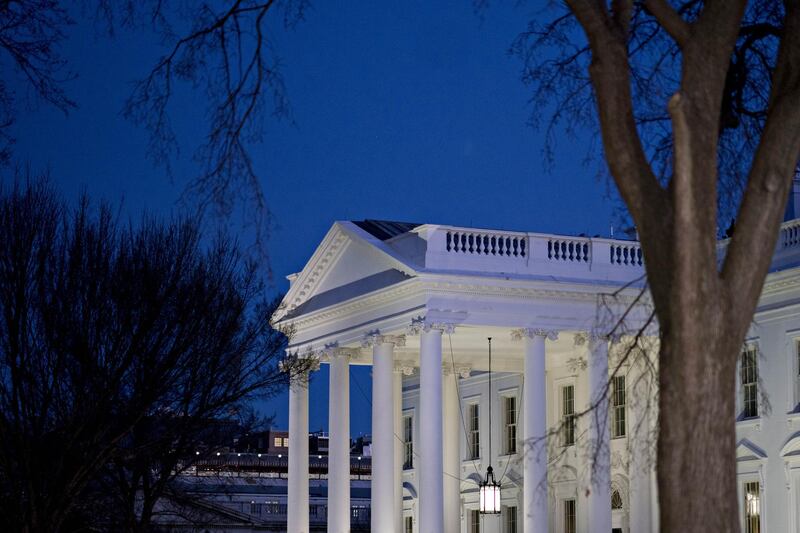 The White House stands in Washington, D.C., U.S., on Friday, Jan. 19, 2018. Temporary government funding runs out at midnight Friday and there's still no agreement on a temporary extension. Democrats are demanding that a stopgap include a provision permanently shielding some undocumented immigrants from deportation, while Republicans want to keep that issue separate from funding and budget negotiations. Photographer: Andrew Harrer/Bloomberg