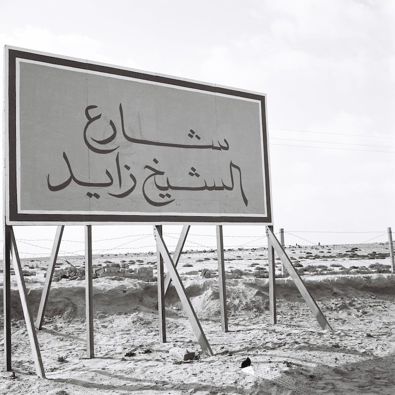 A sign reading Sheikh Zayed Road on the newly opened section of the E1 in Ras Al Khaimah in the late 1970s. Photo: Alittihad