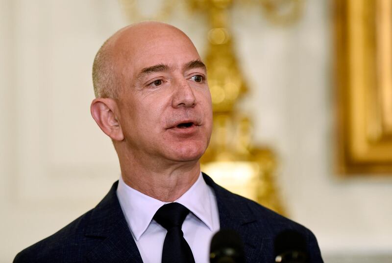 FILE - In this May 5, 2016 file photo, Jeff Bezos, the founder and CEO of Amazon.com, speaks in the State Dining Room of the White House in Washington. President Donald Trump is criticizing the U.S. Postal Service, saying the agency is â€œlosing many billions of dollars a yearâ€ and asking why it is â€œcharging Amazon and others so little to deliver their packages.â€ Trump tweeted Friday, Dec. 29, that the post office â€œshould be charging MUCH MORE!â€ (AP Photo/Susan Walsh, File)