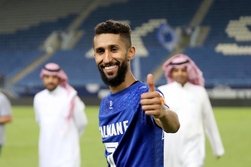 Al Hilal player Salman Al Faraj celebrates winning the Saudi Professional League title following a 4-1 win over Al Hazem in August 2020.
