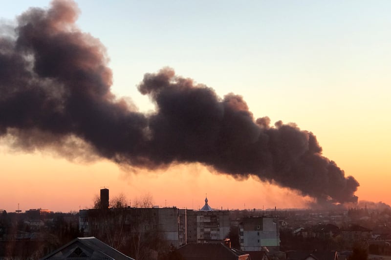 A cloud of smoke rises after an explosion in Lviv, western Ukraine, on March 18. AP