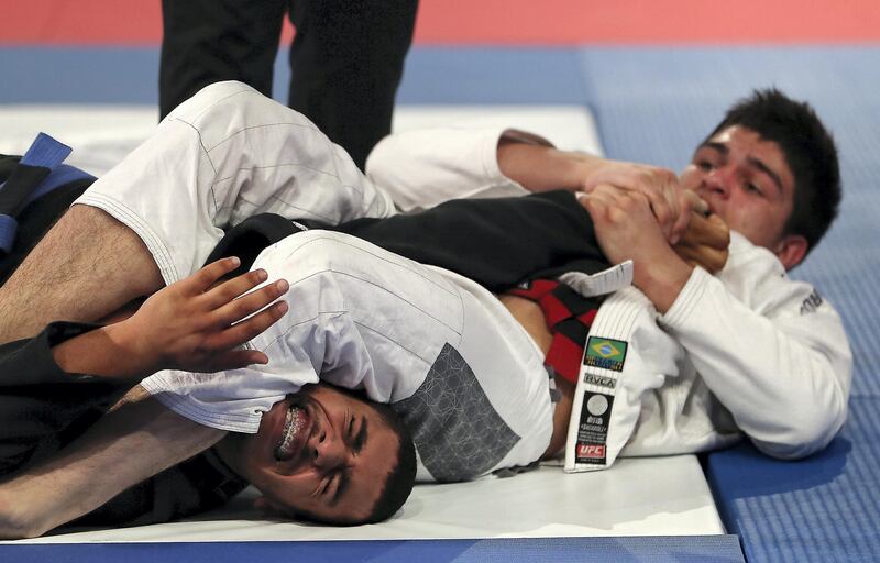 ABU DHABI,  UNITED ARAB EMIRATES , April 22 – 2019 :- Murafis Ismailov (red from Lion Academy ) vs Sultan Khamis Alameri ( blue from Baniyas Jiu Jitsu Club ) during the final of male 81 kg category in  the Abu Dhabi World Professional Jiu Jitsu  Championship 2019 held at the Mubadala Arena in Abu Dhabi. Murafis won the fight. ( Pawan Singh / The National ) For Sports. Story by Amith