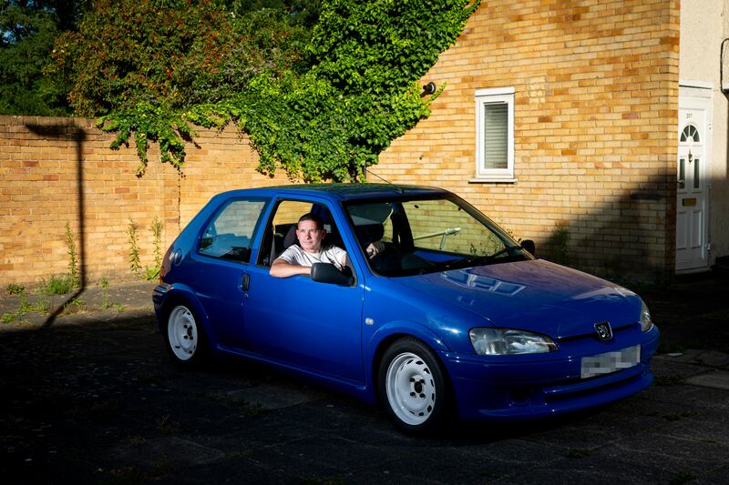 Paul Tucker, 52, a vehicle bodyfitter from Northolt, West London, with his 1998 Peugeot 106 Rally. 'I feel targeted, it's just another money-making scheme and if the mayor [Sadiq Khan] was serious he'd issue a complete ban'