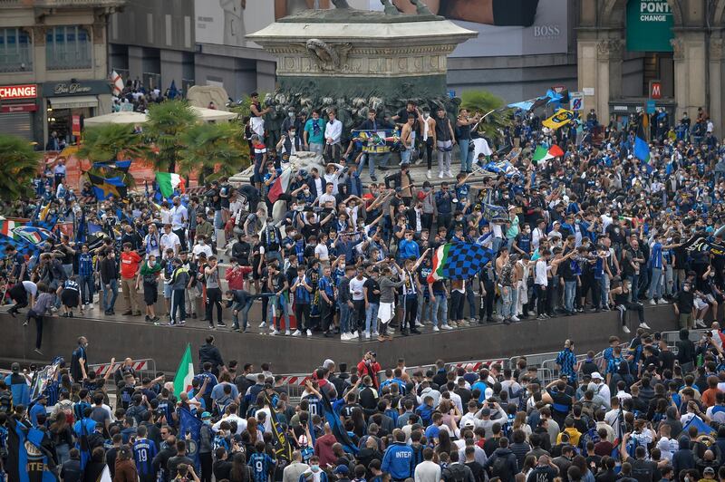 Inter Milan fans celebrate after their team won first Serie A title in more than a decade. AP