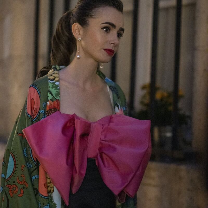 Lily Collins (Emily) in a cocktail dress by Danish brand Rotate mixed with a vintage kimono. All photos: Netflix