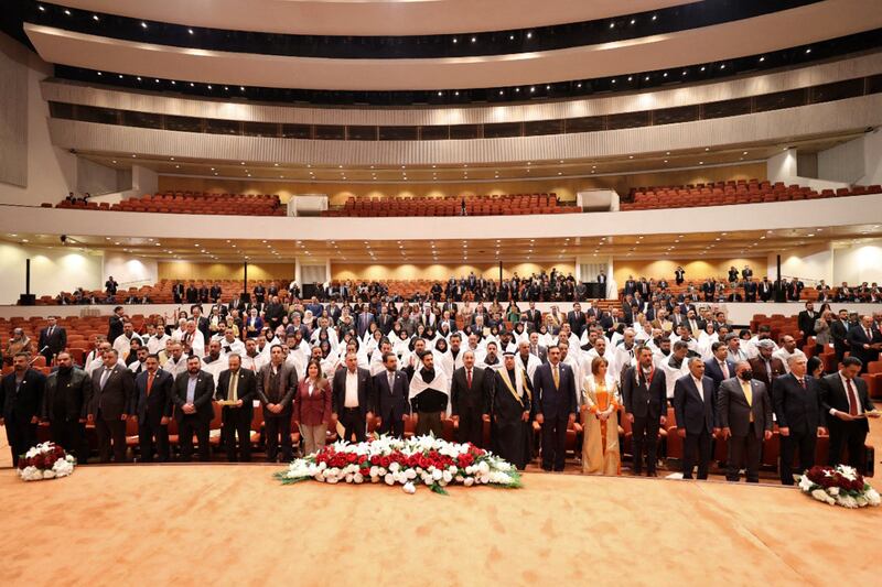 A handout picture released by Iraq's Prime Minister's Media Office on January 9, 2022 shows Iraqi lawmakers attending the inaugural session of the parliament in Baghdad, three months after legislative elections. AFP