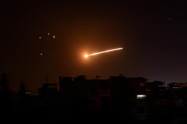 An air strike is seen above Damascus in February. Reuters