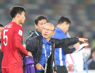 epa07269712 Park hang-Seo (R), head coach of Vietnam, reacts during the 2019 AFC Asian Cup group D soccer match between Iraq and Vietnam in Abu Dhabi, United Arab Emirates, 08 January 2019.  EPA/ALI HAIDER