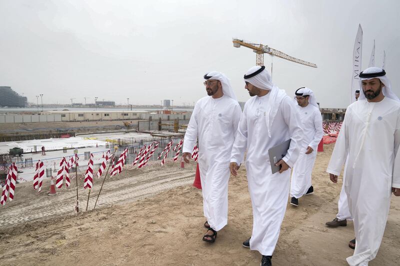 YAS ISLAND, ABU DHABI, UNITED ARAB EMIRATES - March 01, 2018: HH Sheikh Mohamed bin Zayed Al Nahyan, Crown Prince of Abu Dhabi and Deputy Supreme Commander of the UAE Armed Forces (L),  inspects urban development and tourism projects, at Yas Bay. Seen with HE Mohamed Khalifa Al Mubarak, Chairman of the Department of Culture and Tourism and Abu Dhabi Executive Council Member (2nd L) and HE Mohamed Mubarak Al Mazrouei, Undersecretary of the Crown Prince Court of Abu Dhabi (R).

( Mohamed Al Hammadi / Crown Prince Court - Abu Dhabi )
---