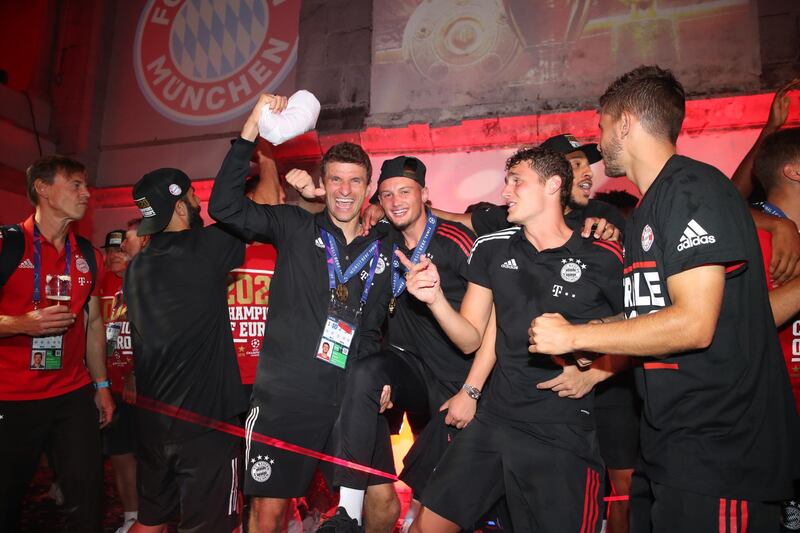 Bayern Munich's Thomas Mueller, centre, celebrates with teammates. EPA