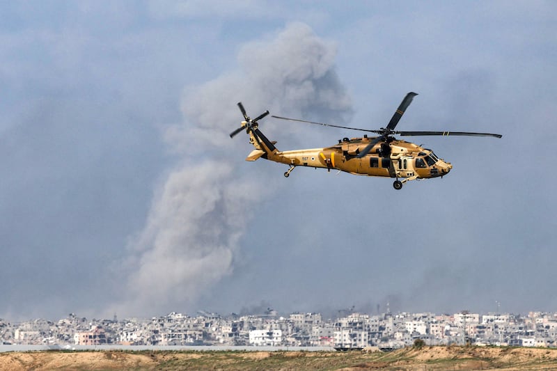 A Black Hawk military transport helicopter flying near the border with the Palestinian territory. AFP