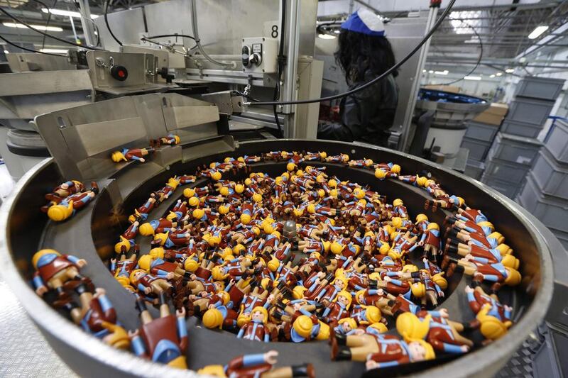 Playmobil figures are seen on the production line at the Playmobil Malta factory. Darrin Zammit / Reuters