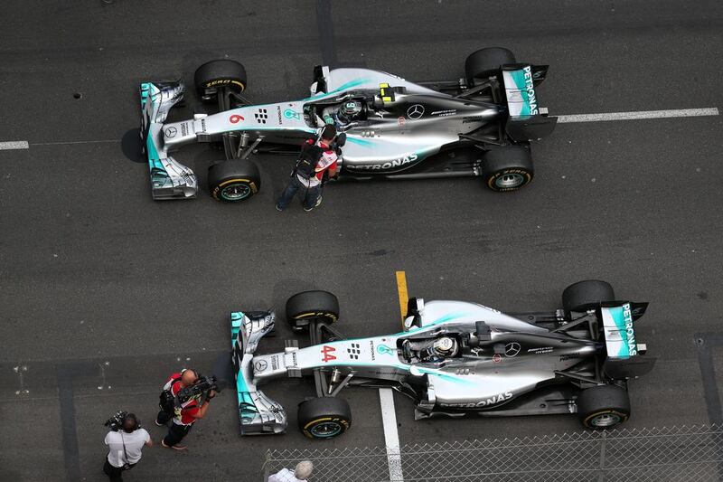 Nico Rosberg, top, and Lewis Hamilton, are fighting for the world title in the same car. Mark Thompson / Getty Images