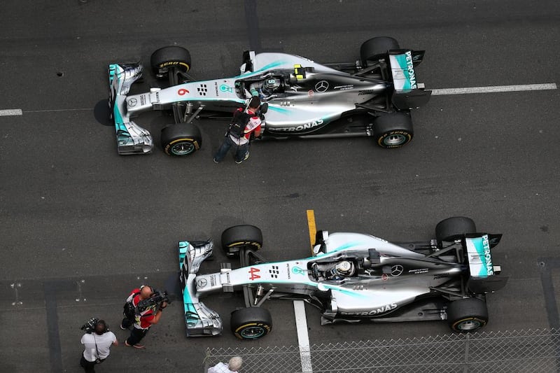 Nico Rosberg, top, and Lewis Hamilton, are fighting for the world title in the same car. Mark Thompson / Getty Images