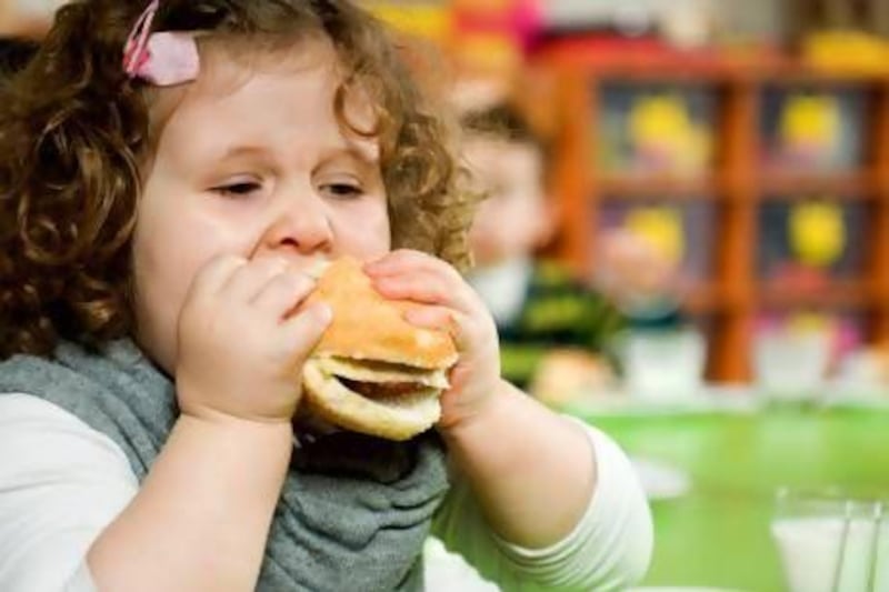 According to the Dubai-based nuritionist Rashi Chowdhary, when a child bites into a burger, the brain reward system is activated and the child will feel a complete lack of control and an intense demand from the brain for more food. iStockphoto