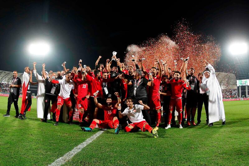 Bahrain players celebrate. AFP