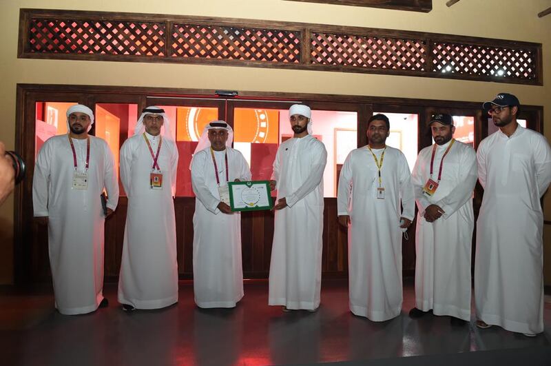 An Emirati man who found a purse containing Dh14,750 at Dubai Expo 2020 and handed it to authorities was honoured by Dubai Police for his honesty. Photo: Dubai Police