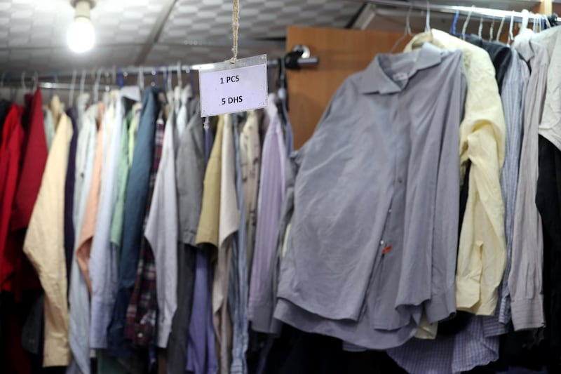 Abu Dhabi, United Arab Emirates - June 19, 2019: Thrift clothes shop Jamal Kamal ready made garments shop. Wednesday the 19th of June 2019. Hamdan Bin Mohammed Street, Abu Dhabi. Chris Whiteoak / The National