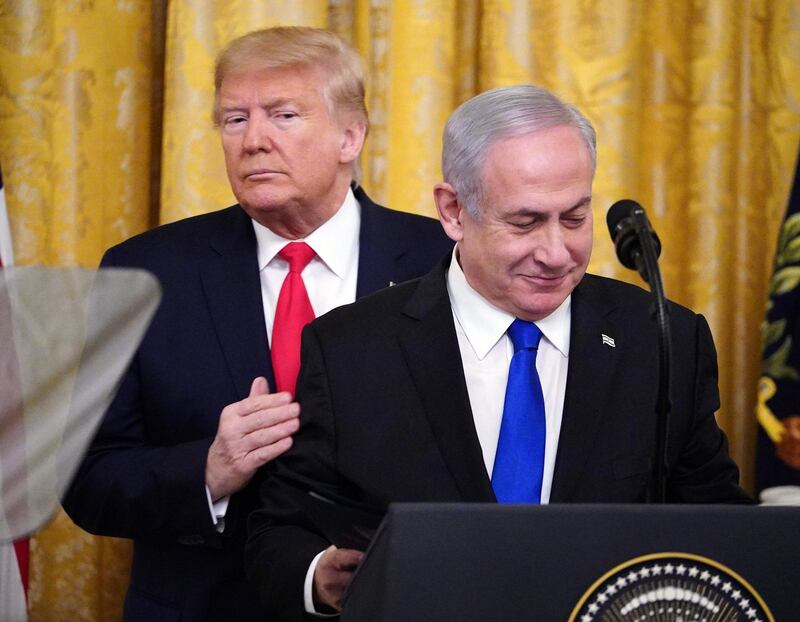 US President Donald Trump and Israeli Prime Minister Benjamin Netanyahu take part in an announcement of Trump's Middle East peace plan in the East Room of the White House in Washington. AFP