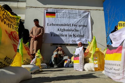 Afghan families receive food aid distributed by the German government in Kabul, Afghanistan, December 6.  The UN World Food Program called for a 2. 6 billion dollar aid to address the humanitarian crisis in Afghanistan, where 3. 2 million children face hunger and malnutrition. EPA 
