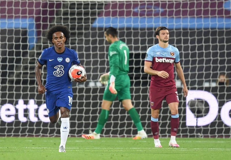 Willian of Chelsea carries the ball after making it 2-2 with a free kick. EPA