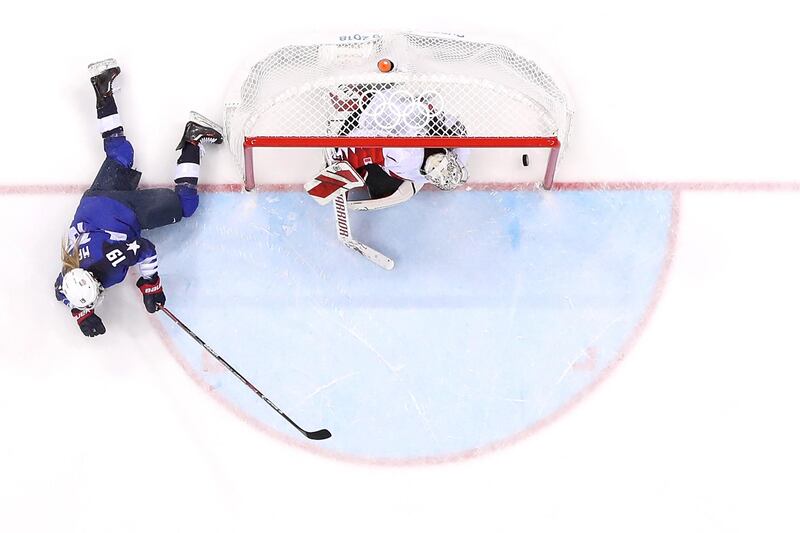 Gigi Marvin of the United States scores during a shootout against Shannon Szabados of Canada during the Women's Gold Medal Game. Bruce Bennett/Getty Images