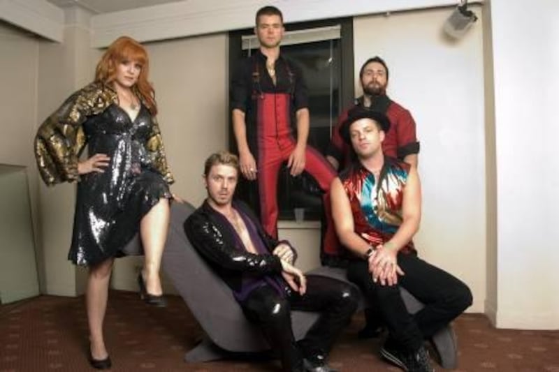 Music group The Scissor Sisters are photographed in New York on Oct. 21, 2006. From left are Ana Matronic, Del Marquis, background center, Jake Shears, sitting center, Paddy Boom and Babydaddy, background right.  (AP Photo/Jim Cooper)