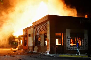 A Wendy’s fast food restaurant burns following a rally against racial inequality and the police shooting death of Rayshard Brooks, in Atlanta, Georgia. Reuters                