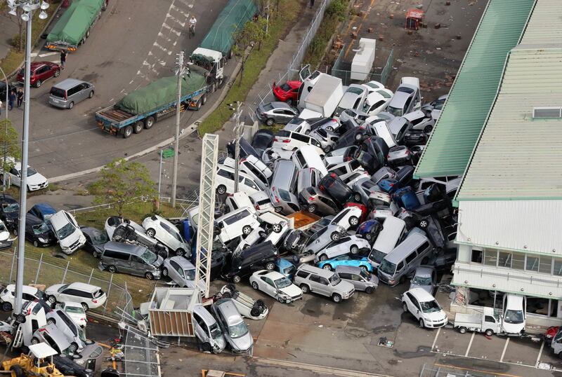 Cars piled up a day after powerful Typhoon Jebi hit the area in Kobe, western Japan. EPA