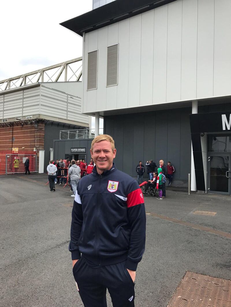 Dean Holden, the assistant head coach at Bristol City, is excited by the challenge of facing the side he supports, Manchester United, in the quarter-finals of the League Cup.  Andy Mitten for The National