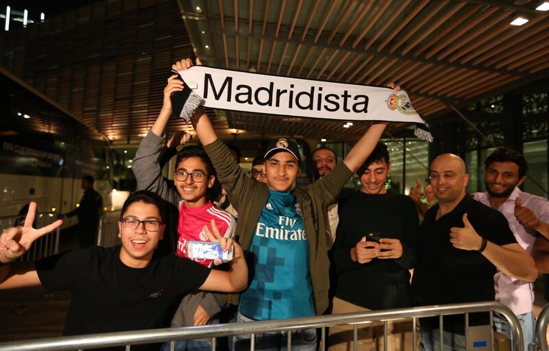 Fans gather to welcome Real Madrid at Four Seasons hotel. EPA