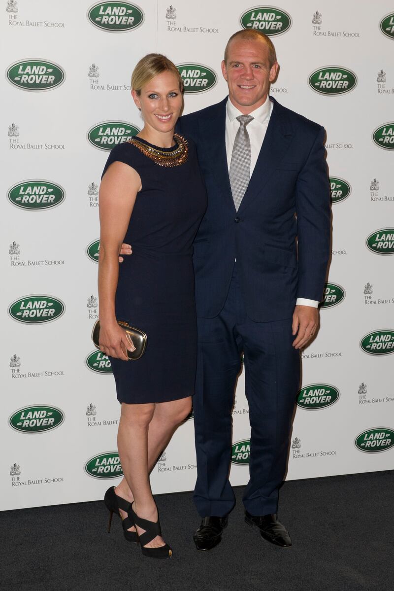 Zara Tindall, wearing a navy shift dress with necklace detail collar, and Mike Tindall attend a Range Rover event on September 6, 2012 in London. Getty Images