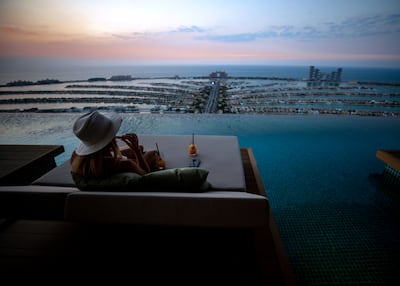 Aura Skypool is a popular spot for sunset. Victor Besa / The National