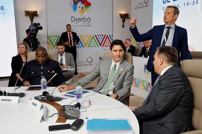 Seated from left, Burundi's President Evariste Ndayishimiye, Canadian Prime Minister Justin Trudeau and Quebec Premier Francois Legault, at the 18th Francophonie Summit, on the Tunisian island of Djerba AFP