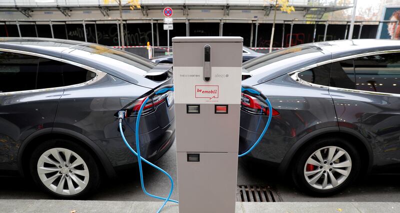 Tesla Model X electric cars at a recharging point in Berlin. Reuters