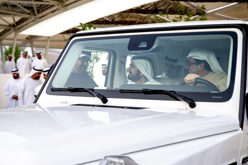Sheikh Mohamed bids farewell to Sheikh Mohammed bin Rashid, who is being driven away from the Sea Palace by Sheikh Mansour. Abdulla Al Neyadi / Presidential Court 