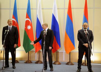 Russia's President Vladimir Putin, Armenia's Prime Minister Nikol Pashinyan and Azerbaijan's President Ilham Aliyev attend a news conference following their trilateral meeting in Sochi, Russia, on November 26. Reuters