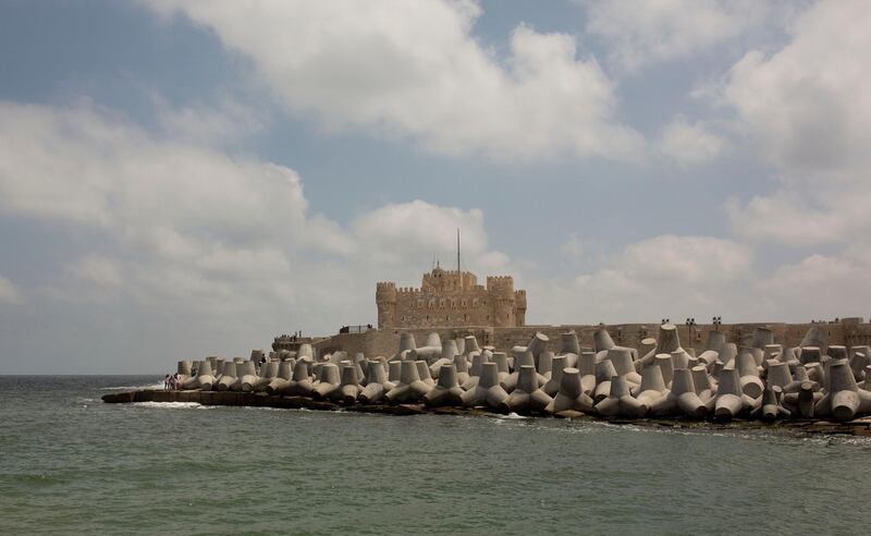 Cement barriers reinforce the sea wall near the citadel in Alexandria, Egypt.  AP