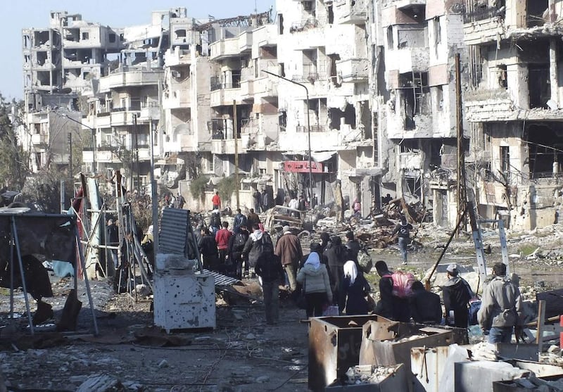 600 people left the besieged ruins of rebel-held central Homs on February 9, 2014, escaping more than a year of hunger and deprivation caused by one of the most protracted blockades of Syria's devastating conflict. Yazan Homsy /Reuters 